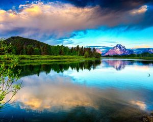 Preview wallpaper lake, mountains, clouds, sky, brightly, water smooth surface, contrast