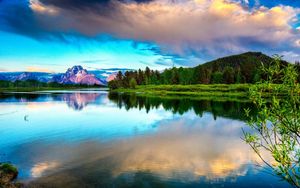 Preview wallpaper lake, mountains, clouds, smooth surface, reflection, sky, brightly, branches
