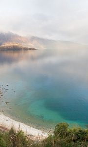 Preview wallpaper lake, mountains, coast, rainbow, after a rain