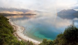 Preview wallpaper lake, mountains, coast, rainbow, after a rain