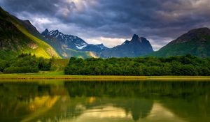 Preview wallpaper lake, mountains, coast, trees, clouds, silence, before a rain