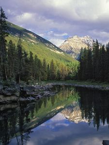 Preview wallpaper lake, mountains, fir-trees, coniferous, shadows, sunlight, horseshoe lake, jasper national park, canada