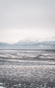 Preview wallpaper lake, mountains, frozen, ice, snow, winter