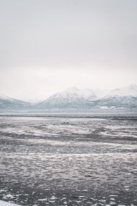 Preview wallpaper lake, mountains, frozen, ice, snow, winter