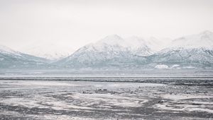 Preview wallpaper lake, mountains, frozen, ice, snow, winter