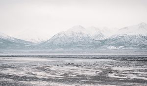 Preview wallpaper lake, mountains, frozen, ice, snow, winter