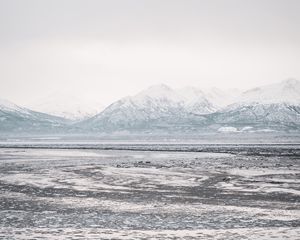 Preview wallpaper lake, mountains, frozen, ice, snow, winter