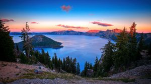 Preview wallpaper lake, mountains, height, island, trees, decline, clouds, sky, stony