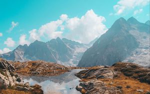 Preview wallpaper lake, mountains, herbs, stones, rocks, landscape