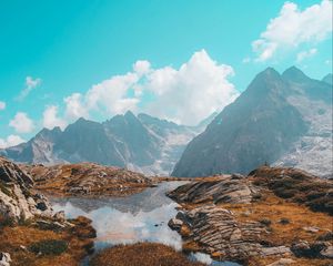 Preview wallpaper lake, mountains, herbs, stones, rocks, landscape