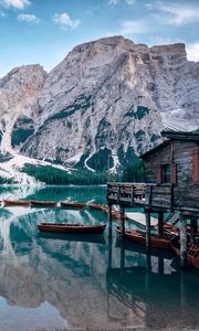 Preview wallpaper lake, mountains, house, boats, landscape, travel