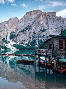 Preview wallpaper lake, mountains, house, boats, landscape, travel