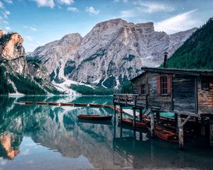 Preview wallpaper lake, mountains, house, boats, landscape, travel