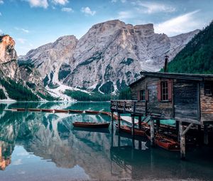 Preview wallpaper lake, mountains, house, boats, landscape, travel