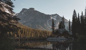 Preview wallpaper lake, mountains, house, forest, shore