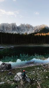 Preview wallpaper lake, mountains, man, alone, nature