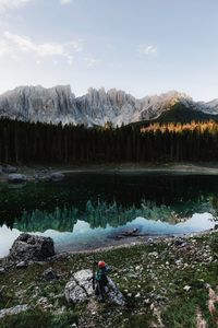 Preview wallpaper lake, mountains, man, alone, nature
