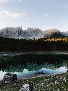 Preview wallpaper lake, mountains, man, alone, nature