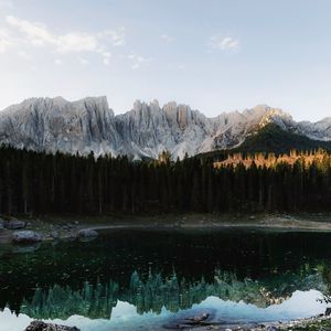 Preview wallpaper lake, mountains, man, alone, nature