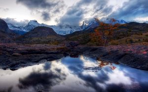 Preview wallpaper lake, mountains, reflection, mirror, tree, orange, twilight