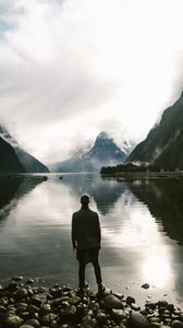 Preview wallpaper lake, mountains, rocks, man, loneliness