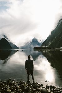 Preview wallpaper lake, mountains, rocks, man, loneliness