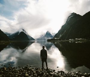 Preview wallpaper lake, mountains, rocks, man, loneliness