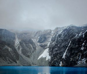 Preview wallpaper lake, mountains, rocks, stones, clouds