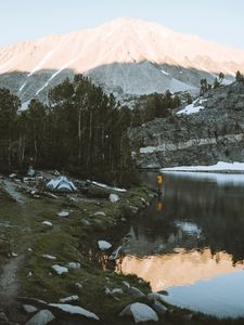 Preview wallpaper lake, mountains, shore, man, camping, nature