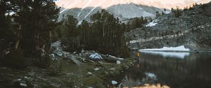 Preview wallpaper lake, mountains, shore, man, camping, nature