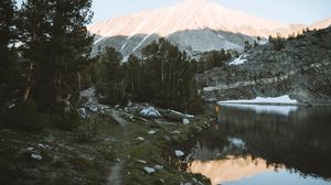 Preview wallpaper lake, mountains, shore, man, camping, nature