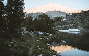 Preview wallpaper lake, mountains, shore, man, camping, nature