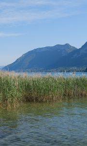 Preview wallpaper lake, mountains, shore, water, reeds