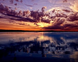 Preview wallpaper lake, mountains, sky, evening, reflection, ripples, surface of the water, colors