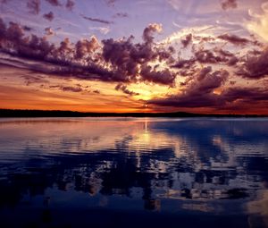 Preview wallpaper lake, mountains, sky, evening, reflection, ripples, surface of the water, colors