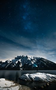 Preview wallpaper lake, mountains, snow, man, night