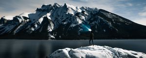 Preview wallpaper lake, mountains, snow, man, night