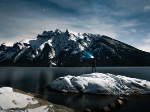 Preview wallpaper lake, mountains, snow, man, night