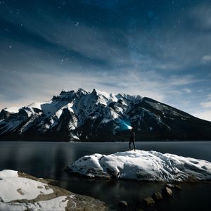 Preview wallpaper lake, mountains, snow, man, night