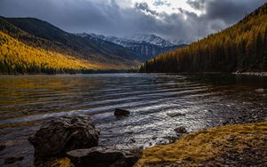 Preview wallpaper lake, mountains, stones, forest, coast