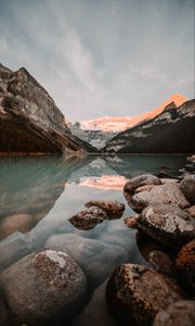 Preview wallpaper lake, mountains, stones, water, reflection