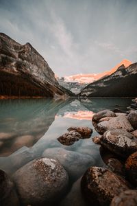 Preview wallpaper lake, mountains, stones, water, reflection