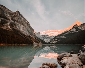 Preview wallpaper lake, mountains, stones, water, reflection