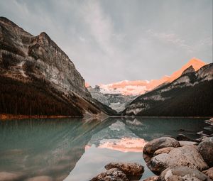 Preview wallpaper lake, mountains, stones, water, reflection