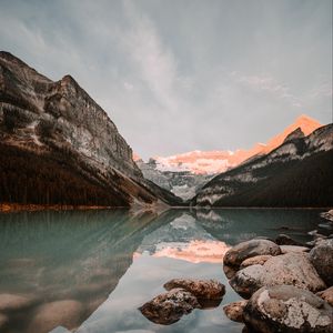 Preview wallpaper lake, mountains, stones, water, reflection