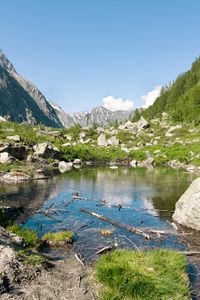 Preview wallpaper lake, mountains, stones, rocks, valley, landscape