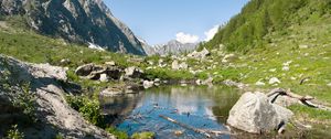 Preview wallpaper lake, mountains, stones, rocks, valley, landscape