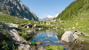 Preview wallpaper lake, mountains, stones, rocks, valley, landscape