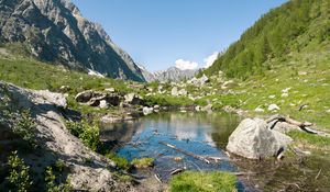 Preview wallpaper lake, mountains, stones, rocks, valley, landscape