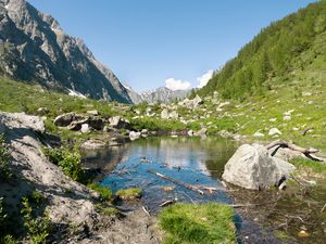 Preview wallpaper lake, mountains, stones, rocks, valley, landscape